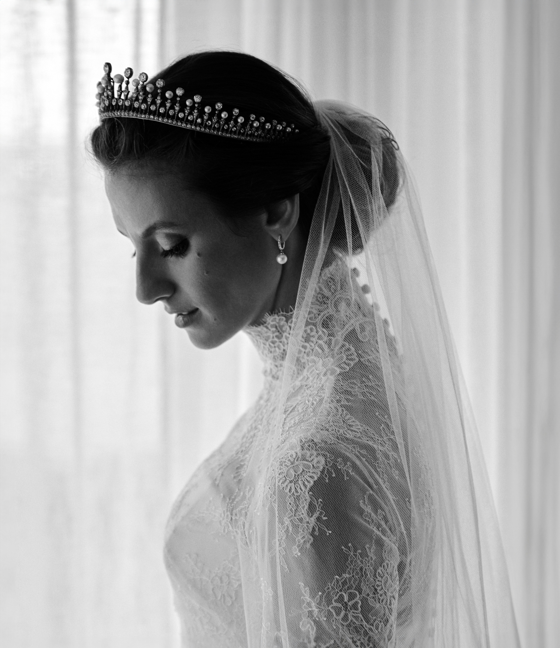 bride wearing veil and crown